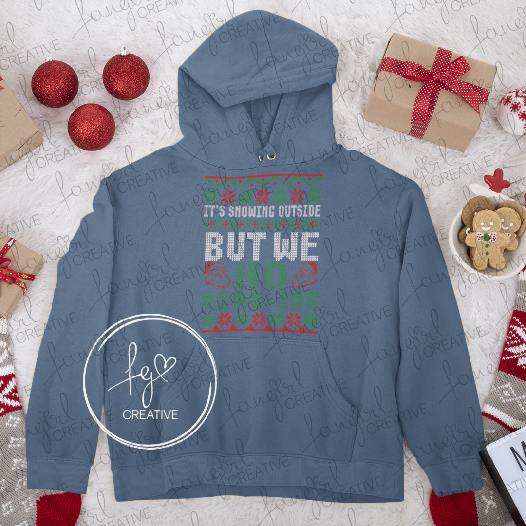 It's Snowing Outside But We Ho Ho Ho-ing Hooded Sweatshirt
